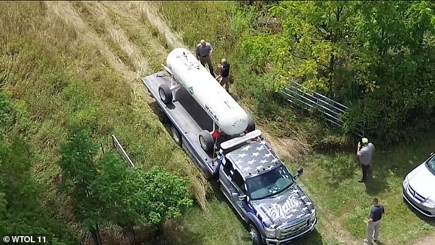 The remains were found in this waterless tank, the woman's relatives said, adding that whoever placed the body in it had re-welded the tank shut and painted over it.