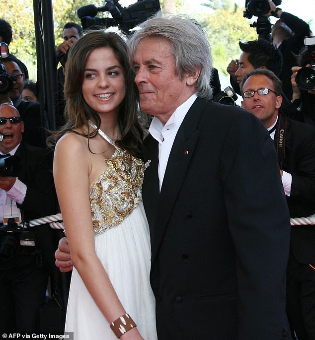 French actor Alain Delon and his daughter Anouchka pose as they arrive at the Festival Palace in Cannes, southern France, on May 24, 2007, to attend the closing ceremony of the 60th Cannes Film Festival.