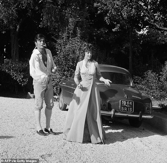 This photo, taken on August 21, 1963 in Nice, shows French actor Alain Delon (left) and British actress Dawn Addams during the filming of 'The Black Tulip' (La Tulipe noire).