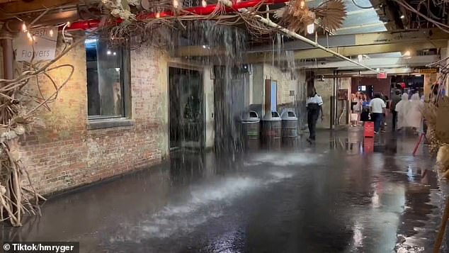 Meanwhile, shocking video in Manhattan shows the moment water pours through the roof of the iconic Chelsea Market, completely flooding the food hall