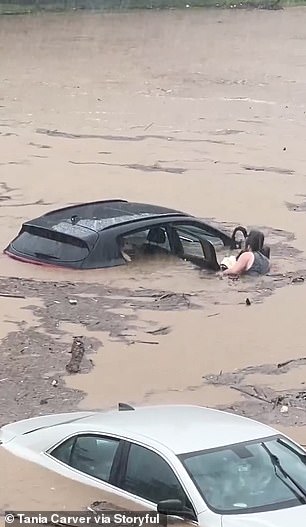 In Connecticut, a man rescued an amputee motorist and his dog from a vehicle stuck in water