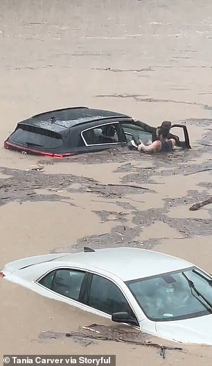 In Connecticut, a man rescued an amputee motorist and his dog from a vehicle stuck in water