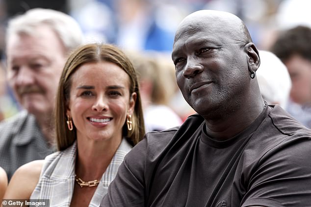 Michael Jordan and his wife, Yvette Prieto, attend the Pro Football Hall of Fame induction ceremony