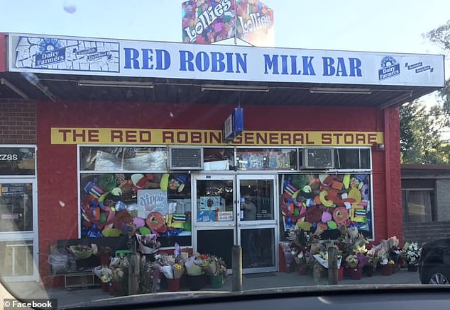 Locals have left dozens of bouquets of flowers on the store's doorstep in the week following his death (see photo) to honor the kindly store owner who treated his customers more like family