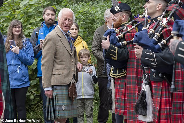 Charles greeted the audience upon his arrival