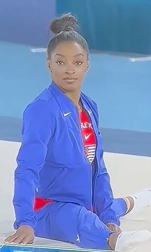 The gymnast was captured staring into the camera in a meme-worthy moment