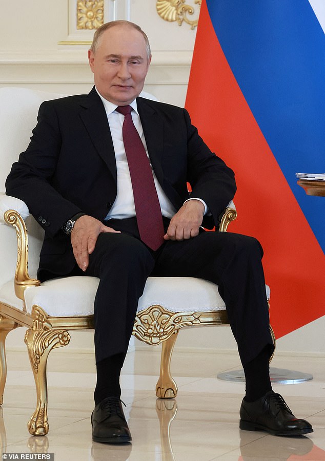 In a statement, Kremlin prosecutors said: “Under the guise of humanitarian ideas, these "fighters for justice"...have promoted criminal investigations against Russia's top authorities. Pictured: Russian President Vladimir Putin on August 19