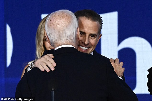 President Joe Biden embraces son Hunter Biden after speech Monday night at the Democratic National Convention in Chicago