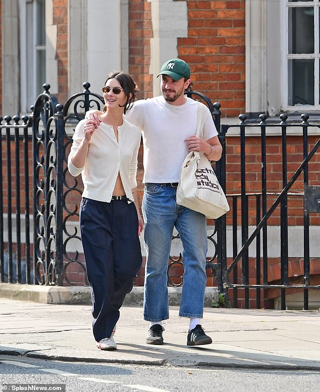 Paul looked happier than ever as he walked with Gracie