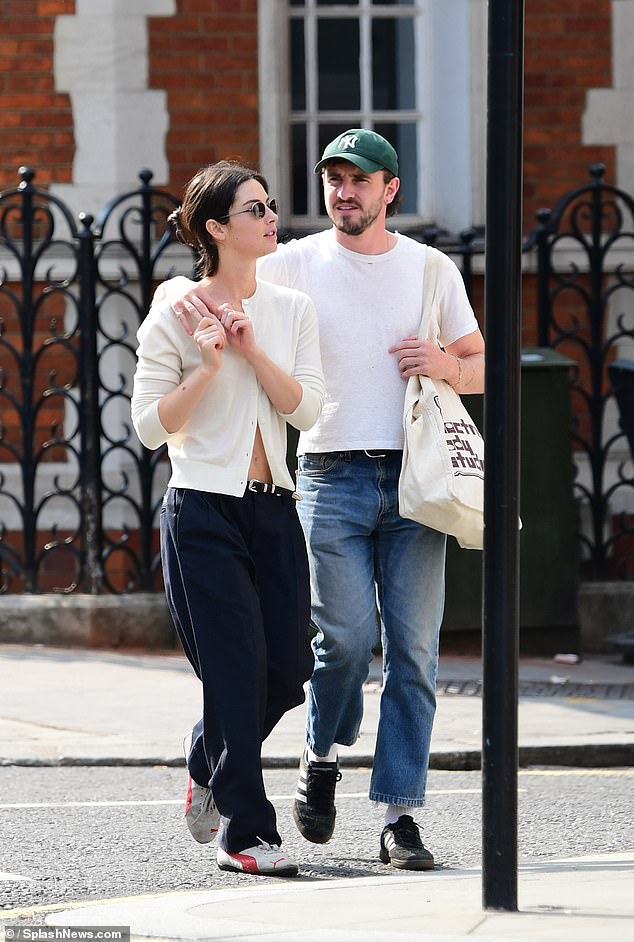 The Normal People star kept it casual for the day in a crisp white T-shirt and blue jeans, which he paired with a green New York Yankees baseball cap