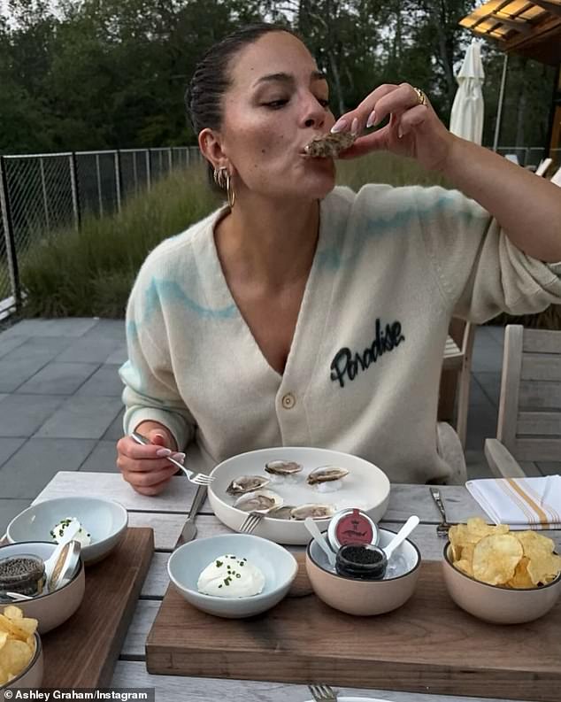 Graham also shared a photo her husband took of her eating raw oysters and caviar