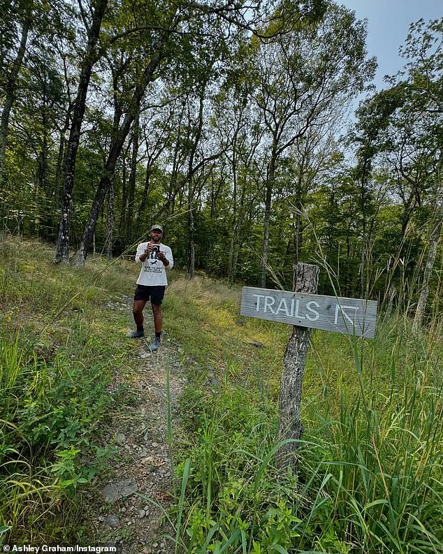 Graham also took sweet snaps of her husband during their little getaway. In her post, she included a photo of him taking a photo of her on a hiking trail