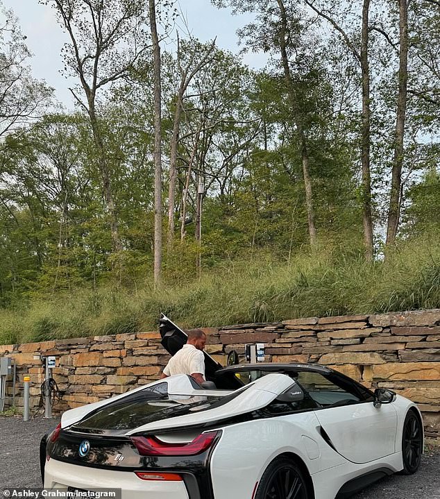 While they enjoyed the wilderness and nature, they did it with style. Graham snapped a photo of her husband getting into a flashy BMW and shared it.