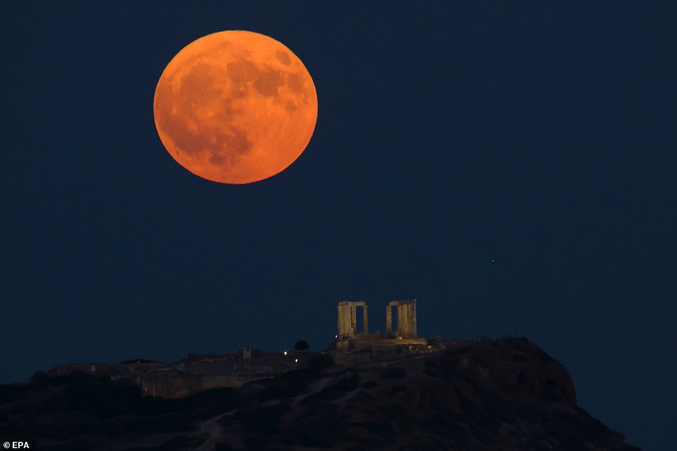 GREECE: The term 'supermoon' is used to describe when the full moon coincides with the moon's closest approach to Earth