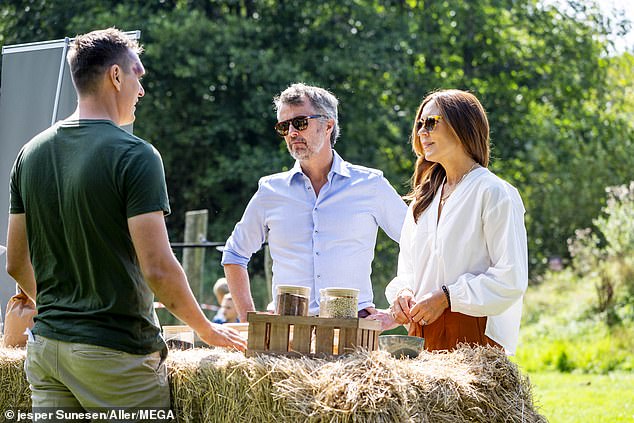 The couple were photographed tasting local produce and speaking to small business owners as they toured the tiny island, 105 miles southeast of Copenhagen.