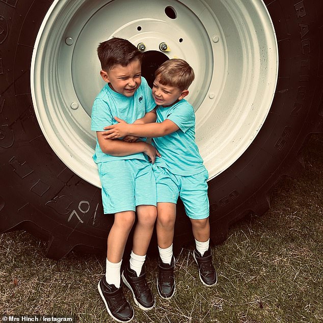 The snaps include several sweet photos of her sons Ronnie, four, and Lennie, two [both pictured]