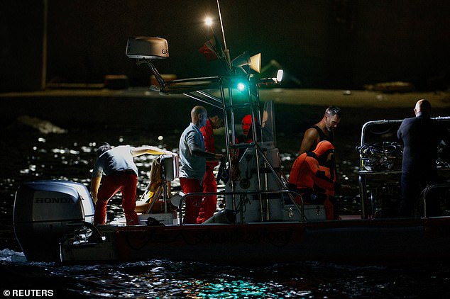 A boat of the emergency and rescue service sails at sea near the spot where a luxury yacht sank, off the coast of Porticello, near the Sicilian city of Palermo, Italy, August 19