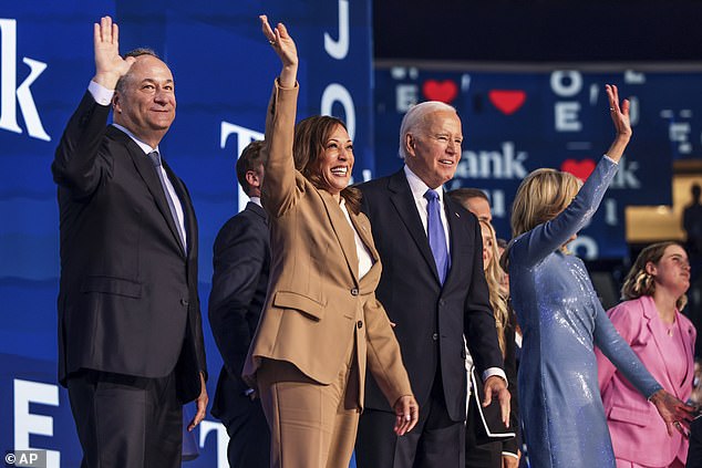 From left: Second Lord Doug Emhoff, Democratic presidential nominee Vice President Kamala Harris, President Joe Biden and First Lady Jill Biden wave to the crowd after Biden's speech at the Democratic National Convention on Monday night.