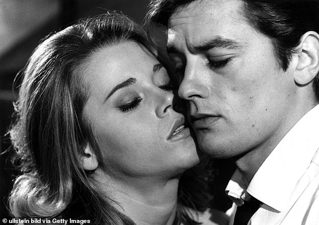 Delon is pictured with Jane Fonda in the film 'The Love Cage', 1964