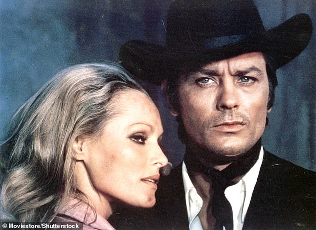 Alain Delon is pictured with co-star Ursula Andress in the film Soleil Rouge