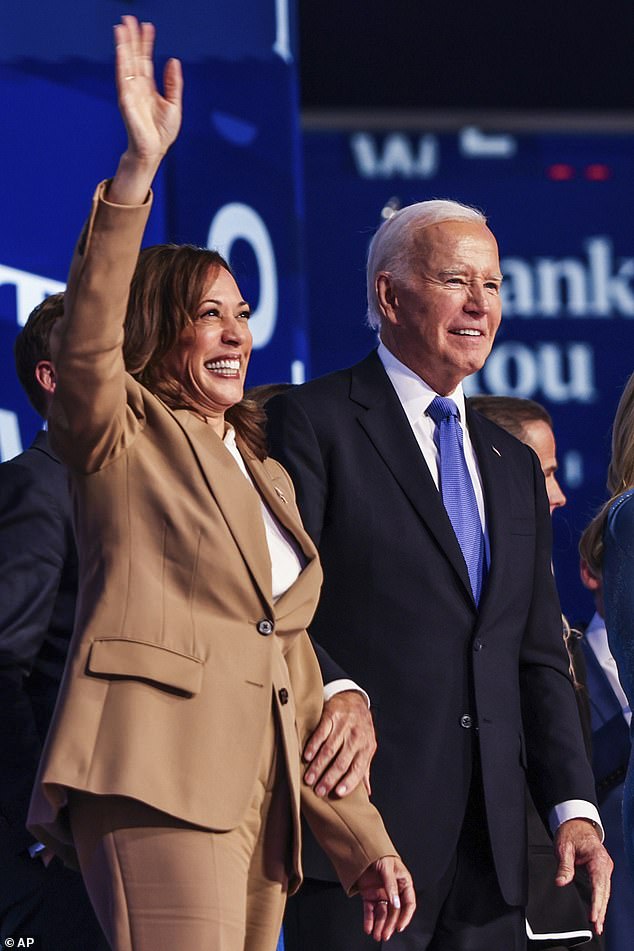 Harris, pictured last night with Biden, joined the president onstage after he finished his speech, hugged him and offered a heartfelt message of support