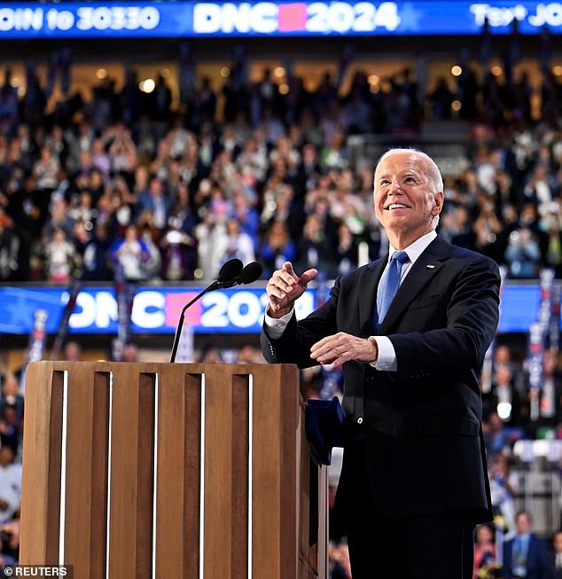 Biden, pictured during his speech last night, called his selection of Harris as his running mate four years ago 