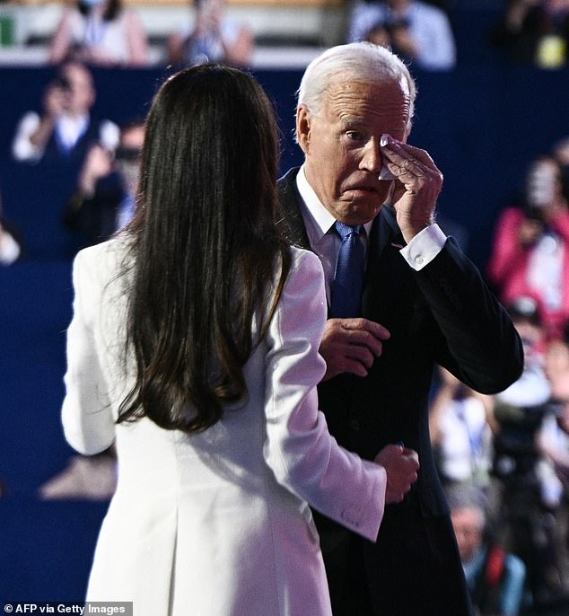 President Joe Biden becomes emotional as his daughter Ashley Biden welcomes him to the stage on the first day of the Democratic National Convention at the United Center in Chicago, Illinois, on August 19, 2024