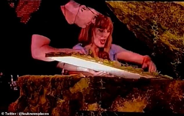 As the rain poured down, Taylor also struggled with her piano, having to call a crew member to help her fix a malfunction