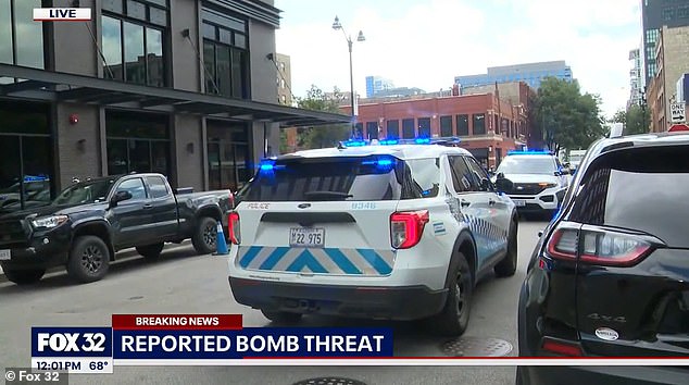 Police cars near the scene of bomb threats in Chicago