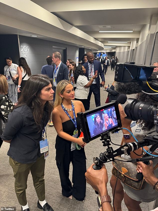 The next day, Claudia posted a video with her mother and father in which they both gave their opinions on the convention. (Pictured: Claudia being interviewed at the DNC)