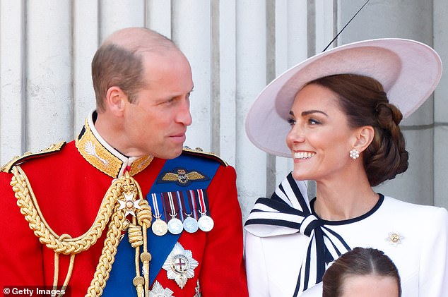 Kate and William share a smile on the balcony during Trooping the Colour in June