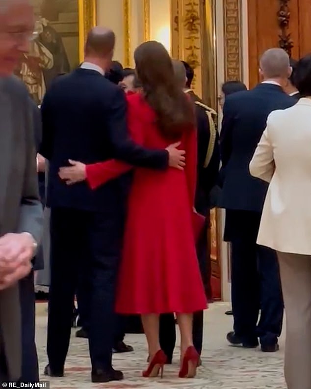 The couple put their arms around each other during the state reception for South Korean President Yoon Suk Yeol and First Lady Kim Keon Hee