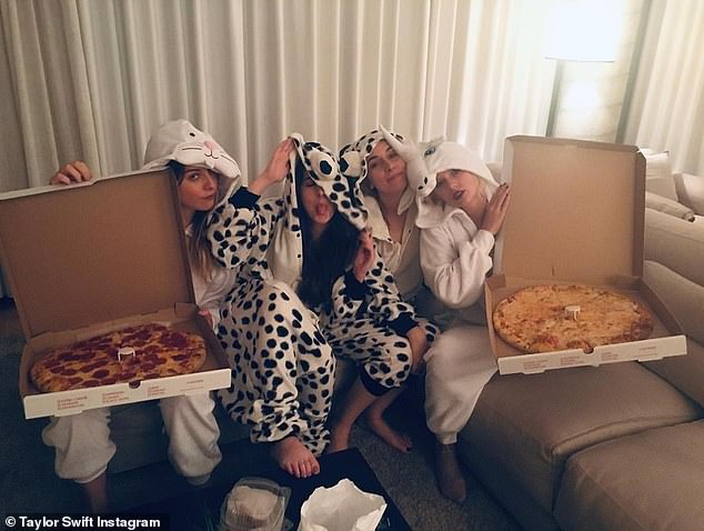 Haim and Taylor pictured in their hotel room after the Met Gala