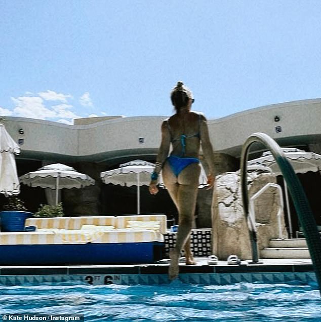 The actress cheekily flashed her bum in the skimpy thong as she gracefully stepped out of the pool to pose for photos