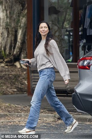 The former model, 47, looked casual during her outing on the North Coast, wearing a pair of loose-fitting light blue jeans and a loose-fitting light gray sweater