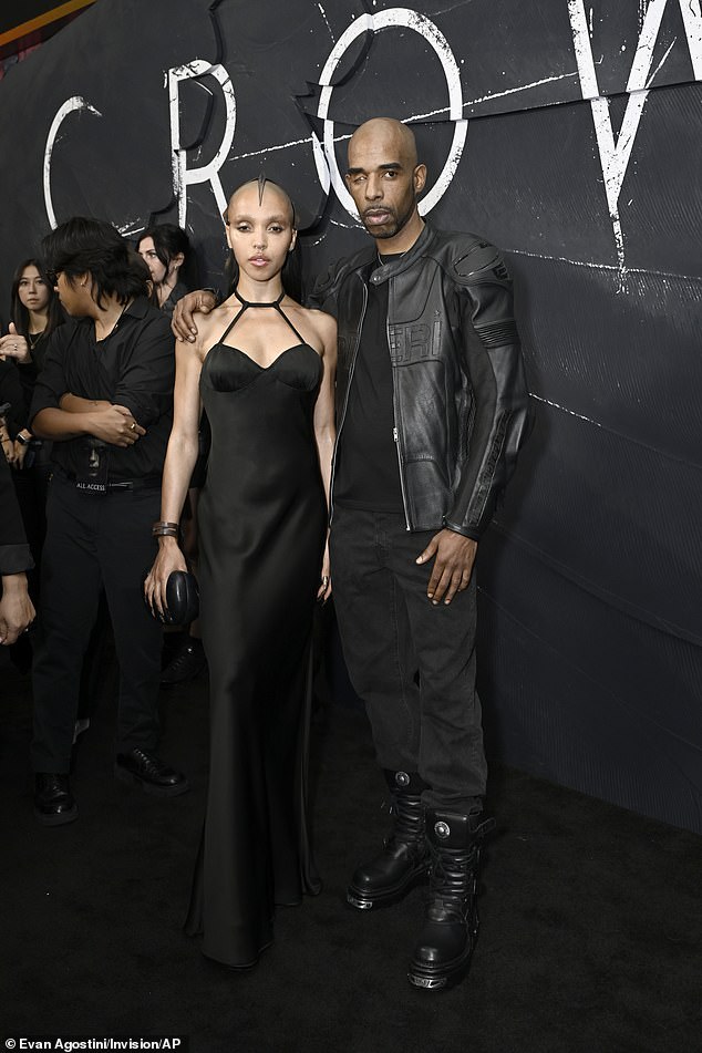 FKA Twigs posed up a storm with musician Trigga who cut a smart casual figure in a black leather biker jacket