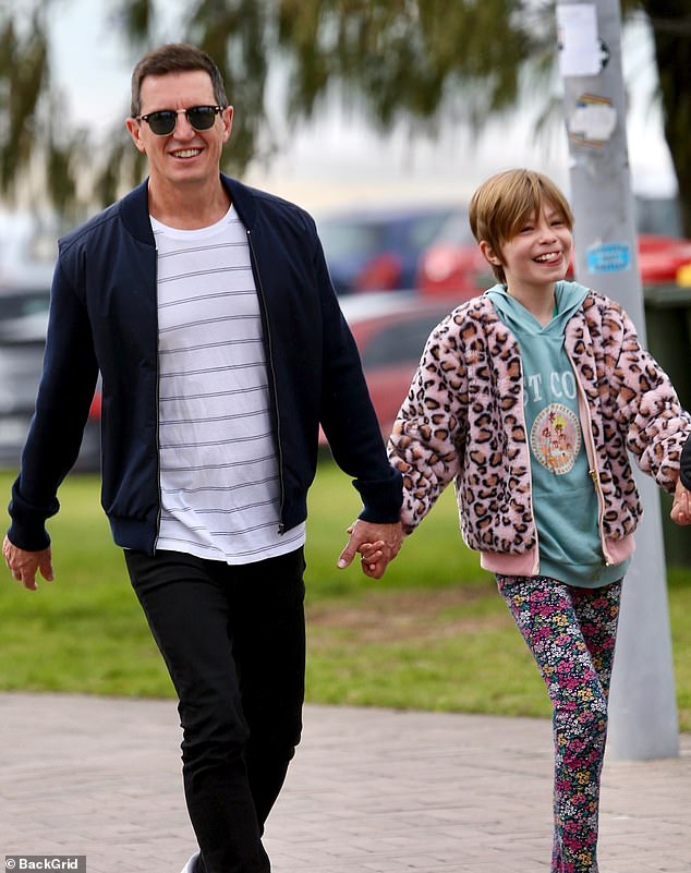 Ruby smiled as she walked hand in hand with her father