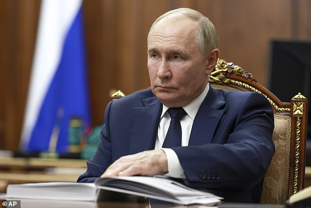 The Putin sycophant, a former KGB general, reiterated Putin's (pictured) position that the conflict is a struggle between the West and Russia