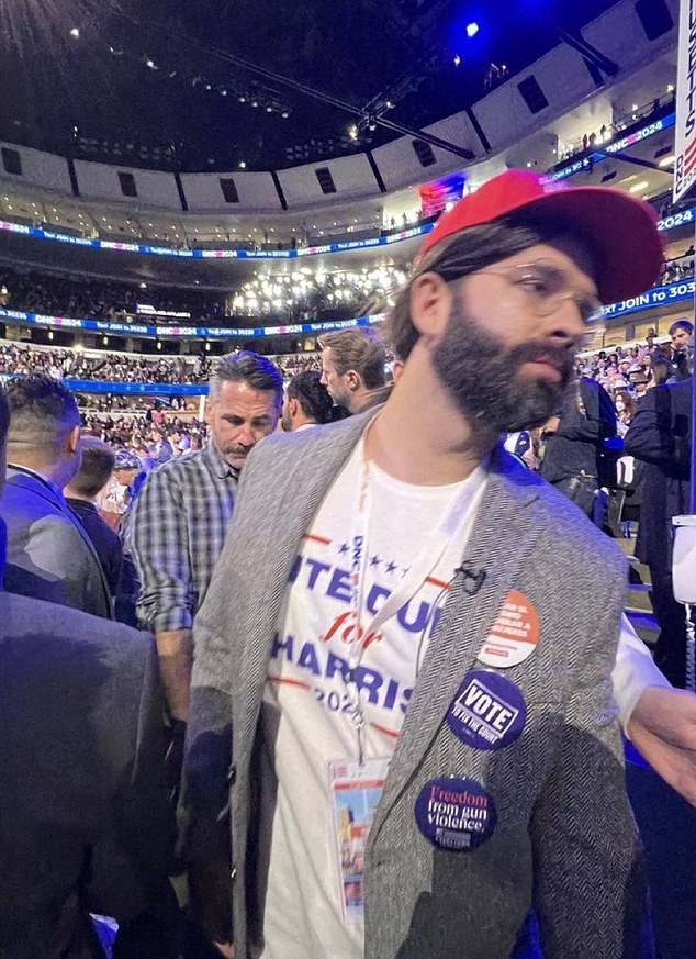 In addition to his ponytail and red Harris cap, Walsh also plastered his blazer with stickers from the Democratic candidate's platform, including 