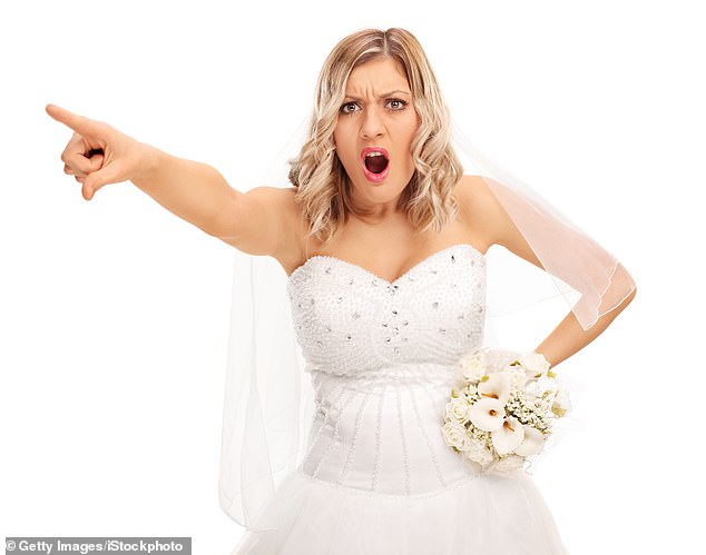 Bride was left furious after woman's son was caught red-handed digging through wedding cake - but woman felt bride should be the first to apologize (stock image)