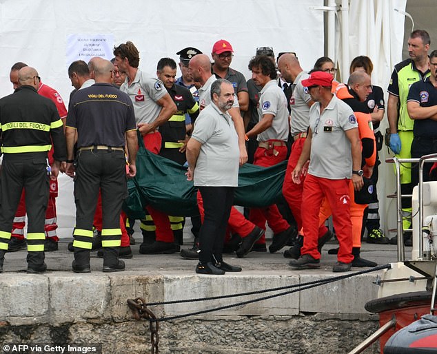 It comes after Italian authorities reported that divers (pictured on Wednesday) found the bodies of two missing passengers aboard the doomed superyacht