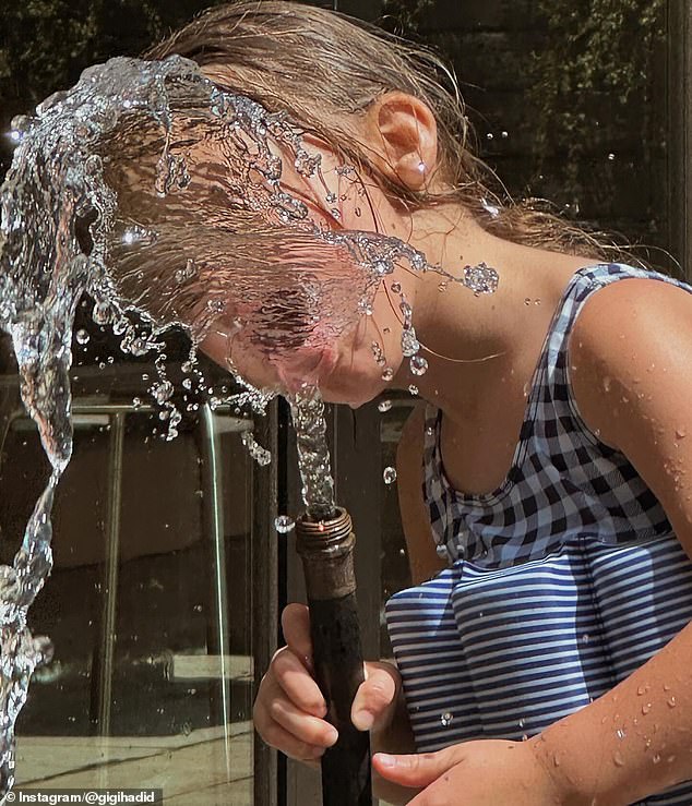 We also see Khai braving the heat by drinking water from a garden hose while enjoying a day at the pool