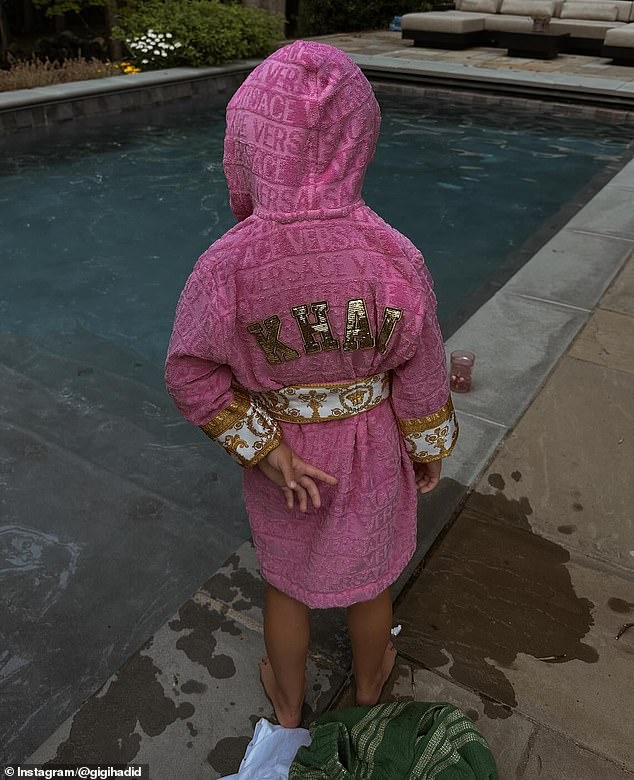 The almost 4-year-old also wore a custom-made bright pink Versace coat with her name in gold lettering on the back