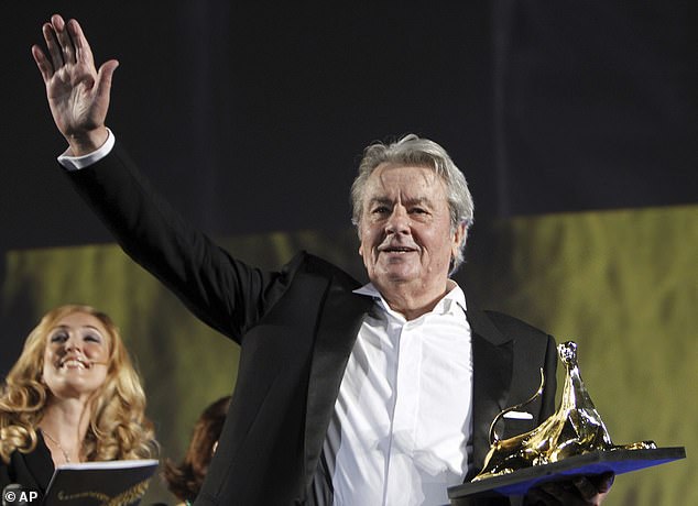 French actor Alain Delon receives a Lifetime Award during an awards ceremony at the Locarno Film Festival on August 2, 2012