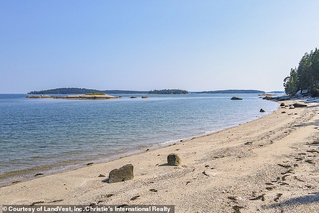 A stone path leads people to the wonderful private beach (pictured) near the house, which offers excellent camping, boating, kayaking and sea glass hunting.