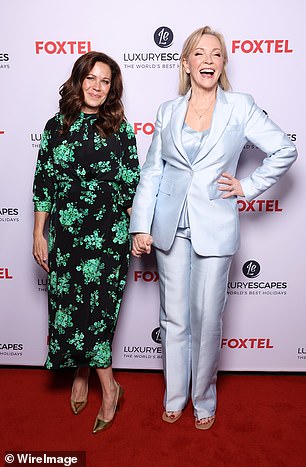 Rebecca Gibney and Jane Hall giggled and cuddled together as they posed for photos on the red carpet