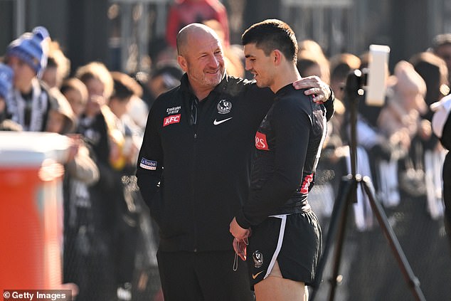 It comes after Craig Kelly (pictured left, with Magpies star Brayden Maynard) was accused of making a series of racist comments about club staff