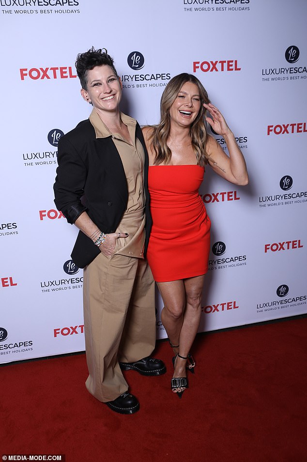 The loved-up couple appeared at the season premiere of The World's Best Holidays at Our Golden Age Cinema on Wednesday. The pair cuddled and giggled as they posed for photos on the red carpet. Both pictured