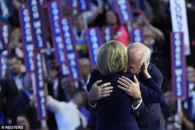 Walz embraces his wife Gwen onstage after accepting the nomination for VP. She spoke in a video introducing her husband earlier in the evening