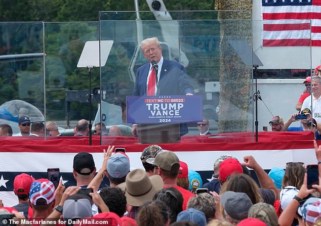 Trump held his first outdoor rally since he was shot in Asheboro, North Carolina. Extra security measures included a panel of bulletproof glass in front of him and three behind him.